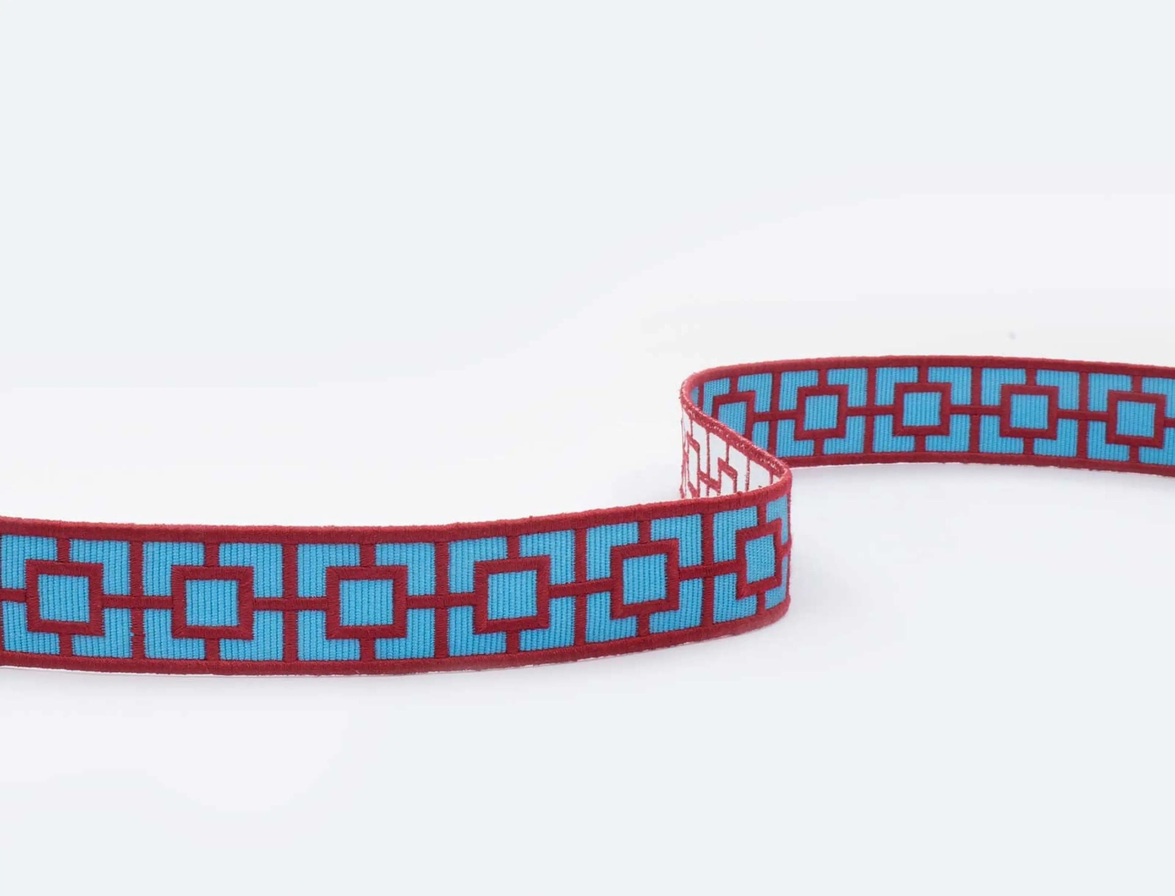 passamanera dal Motivo geometrico in doppio colore.